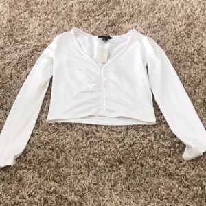 White long sleeve top